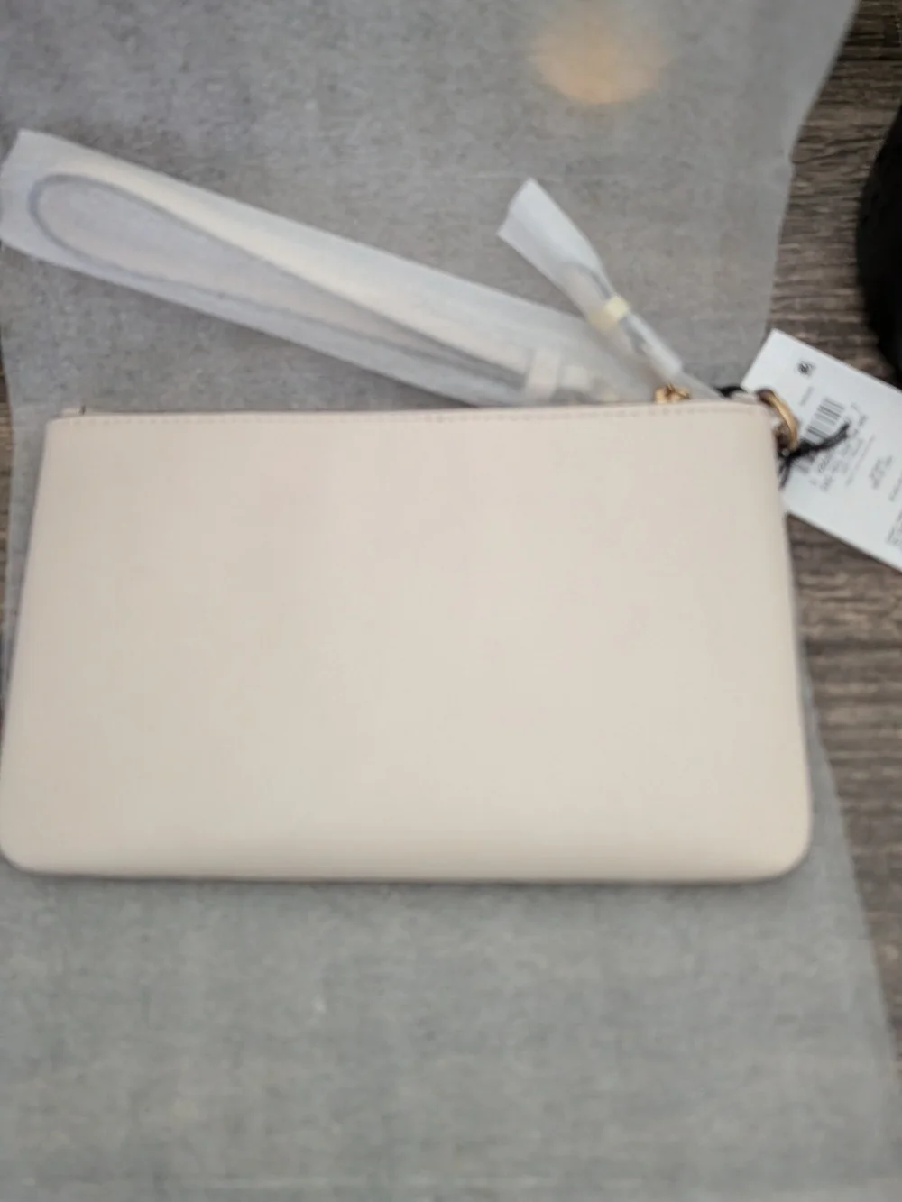 Coach Cream Wristlet with Disney Character Patch Accents